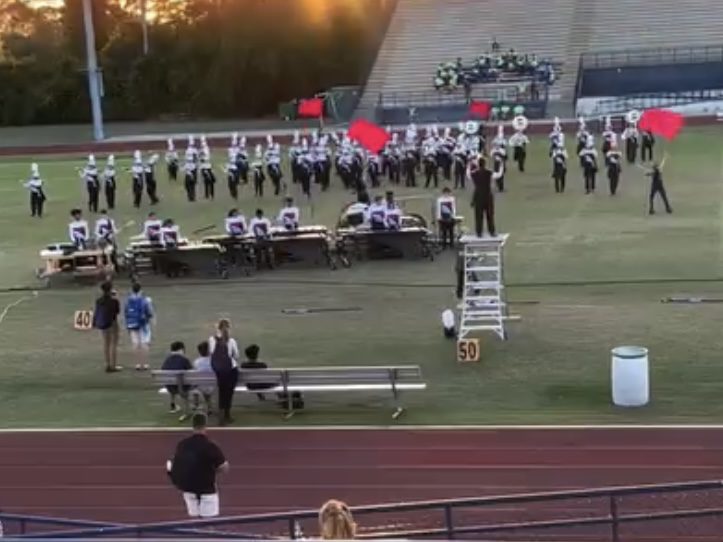 Viper Vanguard marching band in formation on football field