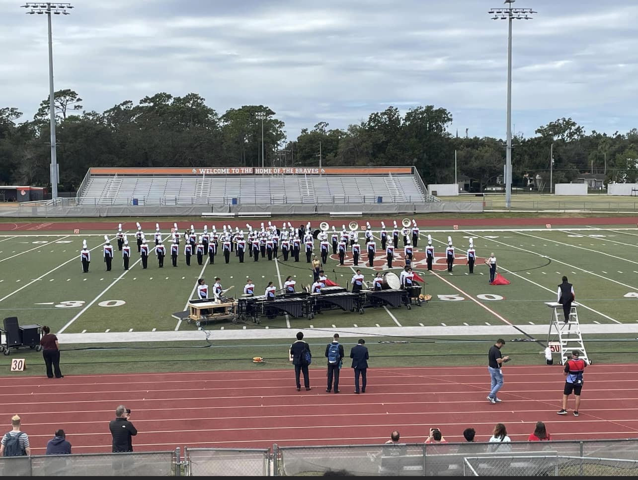 LBV Viper Vanguard marching band in formation on football field